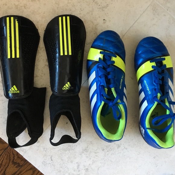 Girls adidas cleats and shin guard set.