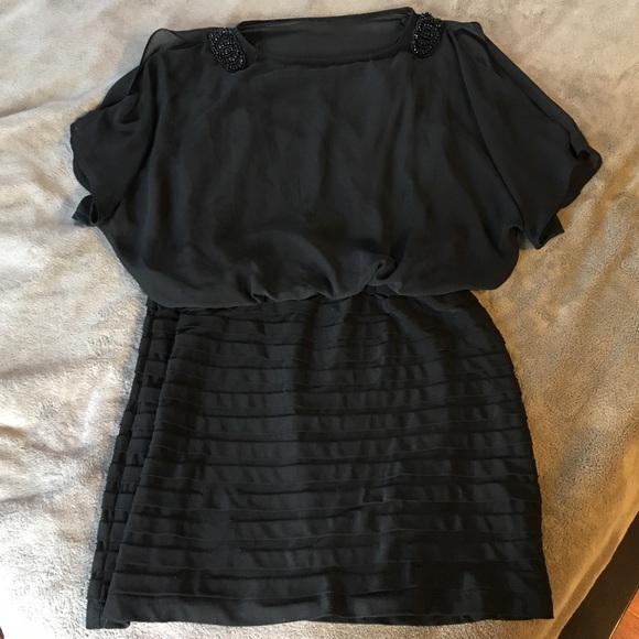 Black cocktail dress. Perfect for holiday party!