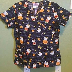Hello kitty scrub top size M. NWT.