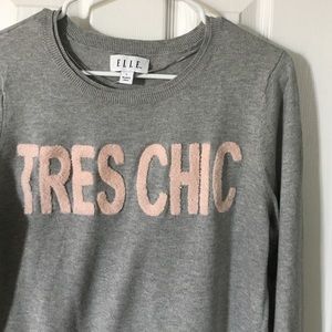 Cute "Tres Chic" sweater.