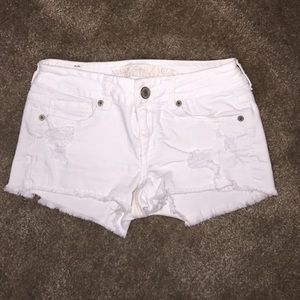 American Eagle Outfitters white distressed shorts