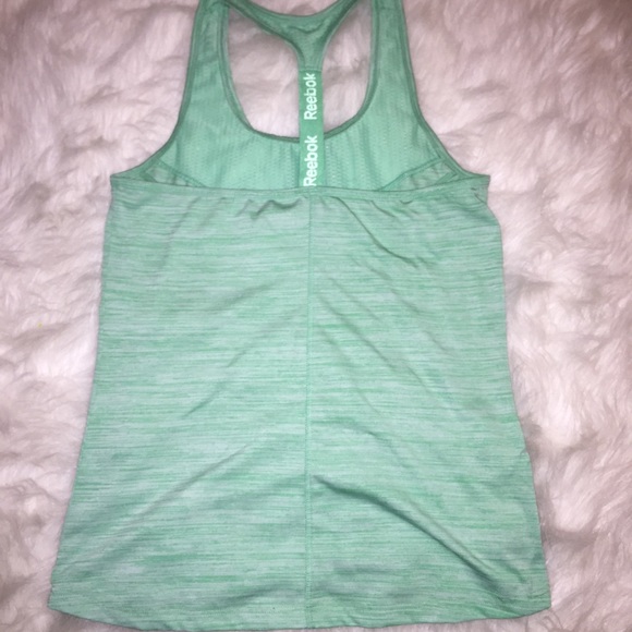 Reebok training top color teal blue.