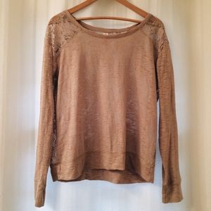 Adorable shirt with a lace back!