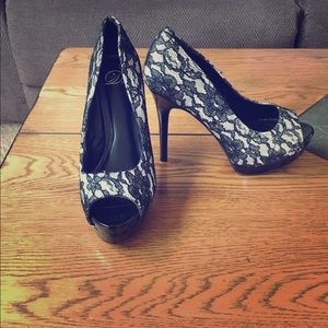 Black and white lace and leather peeptoe heels.