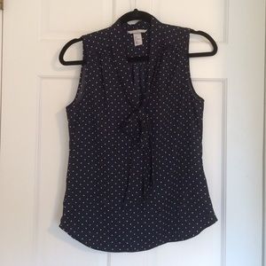 Navy blue top with white polka dots