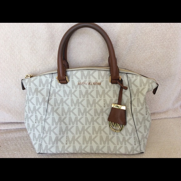 Michael Kors crossbody with top handles bucket bag