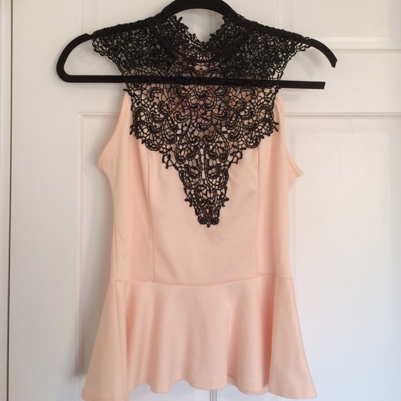 Pink peplum top with lace detail
