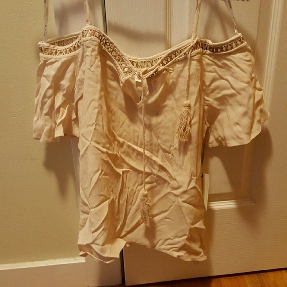 Exposed shoulder crop top