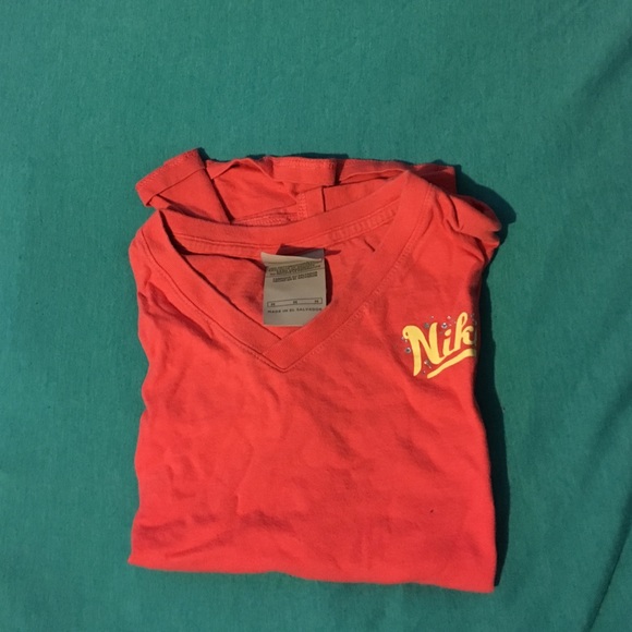 Coral Nike shirt