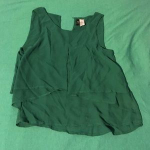Green sleeveless blouse