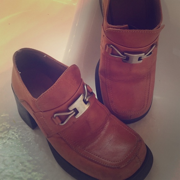 Tan colored leather platform shoes!