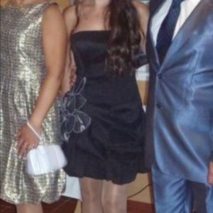 Short cocktail/party dress. Simple, but unique.