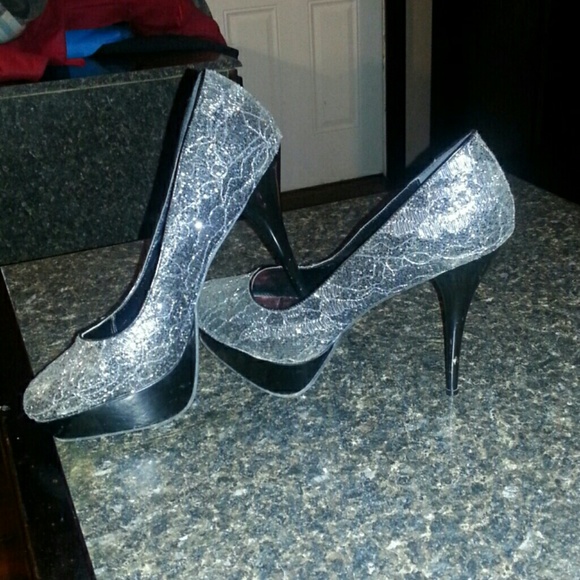 Silver sparkling high heels.  Worn once only!!
