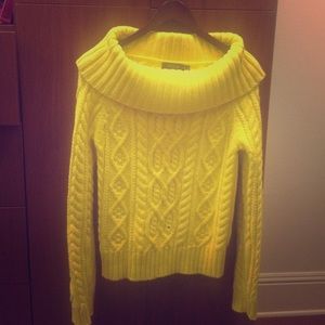 Cable-knit off-the-shoulder sweater. 100% cotton
