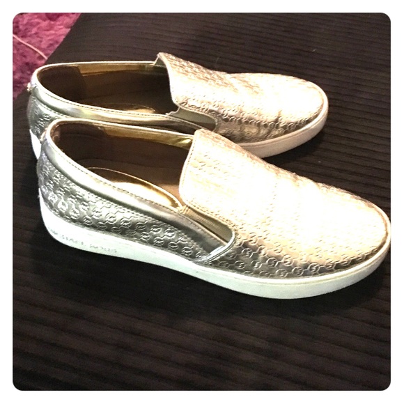 Michael kors champagne gold slip on sneakers