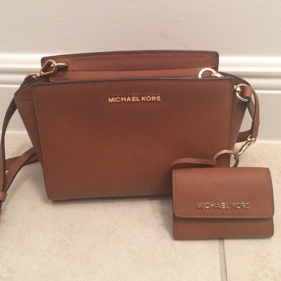Micheal Kors Handbag with matching wallet.