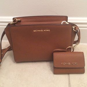 Micheal Kors Handbag with matching wallet.