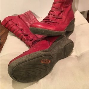 Red mid-calf leather boots