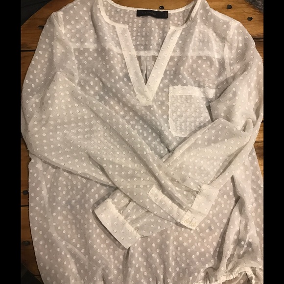 The limited cream long sleeve blouse