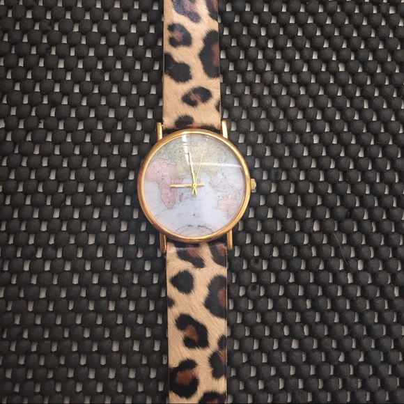 Leopard watch with globe face
