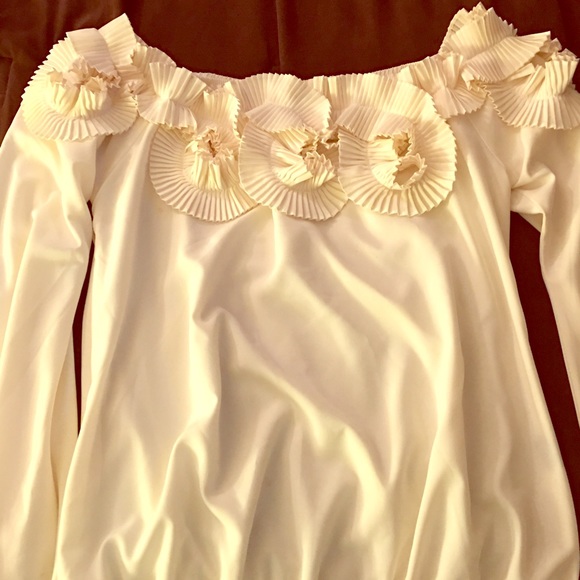 Creme colored.