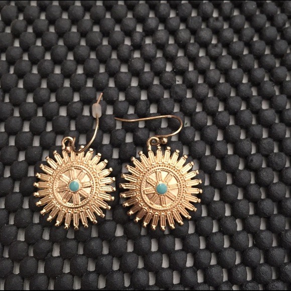 Gold dangling earrings