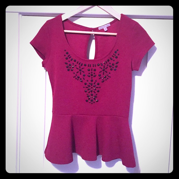 Studded peplum top size M