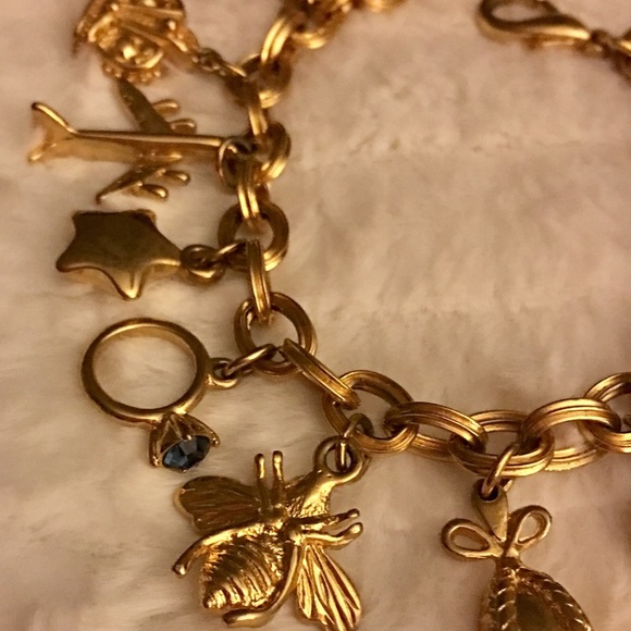 Gold tone charm bracelet adorable and beautiful