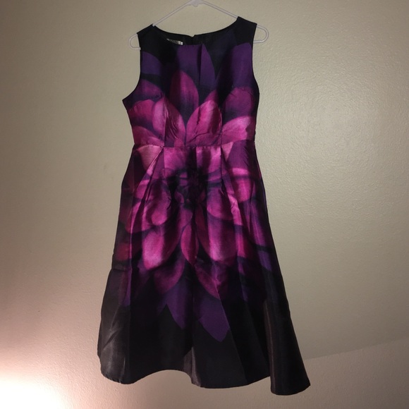 Black dress with purple / pink flower design.