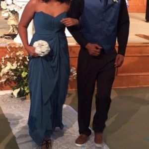 A blue long strapless dress