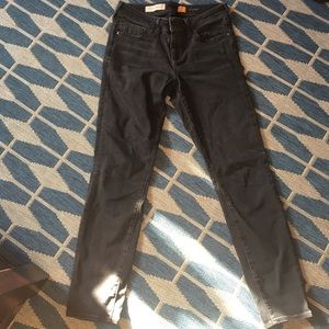 Distressed dark jeans