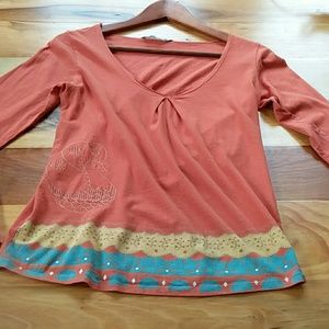 Orange long sleeve shirt