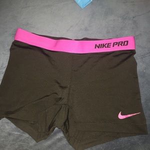 Black and purple Nike pros