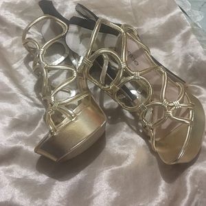 Gold Bebe heels