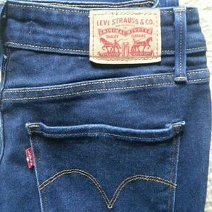 Levi's mid rise skinny jeans