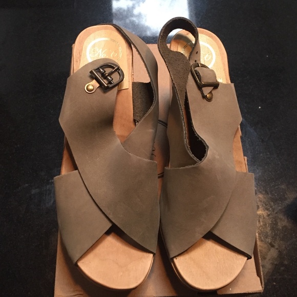 Pair of No. 6 store slingback clogs.  EU 38