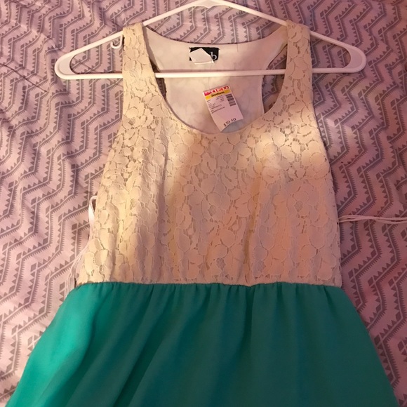A deb cream/turquoise dress
