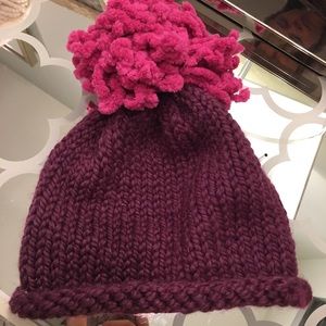 Hand knit magenta hat with super soft pink puff