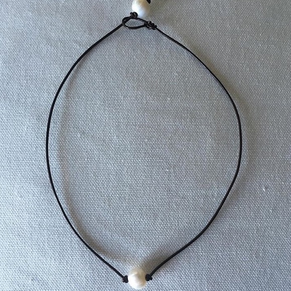 Patagonia Jewelry - Black leather and freshwater pearl necklace.