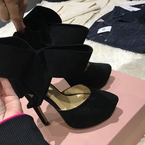 Aminah Abdul Jillil heels