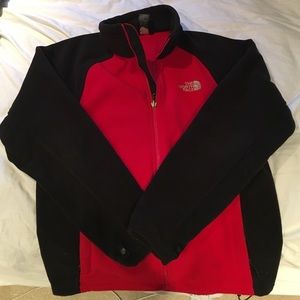 Red and black North Face fleece jacket