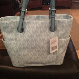 Brand new with tags jet set Michael Kors bag