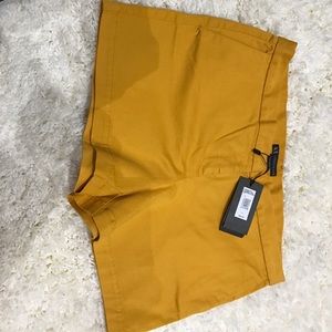 Armani mustard shorts