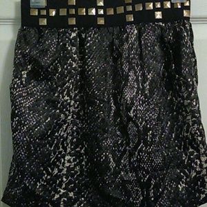 Snakeskin print skirt with banded waist.