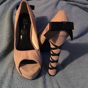 Peak toe heels