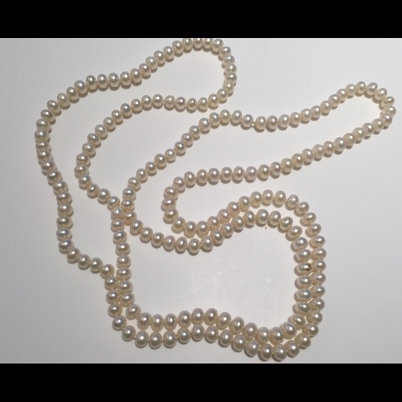 Long strand pearl necklace
