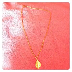 A gold leaf necklace