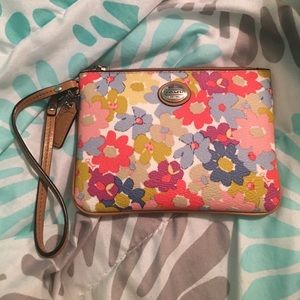 Floral coach clutch