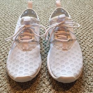 White Nike Juvenate Trainers