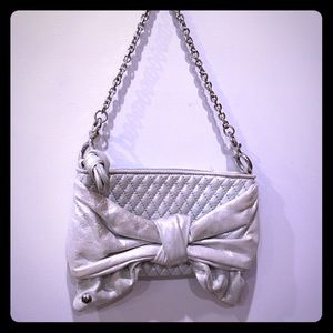 Metallic Silver Juicy Couture Quilted Bow Clutch